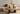 PTMD Yoel naturel salontafel van versteend hout met messing onderstel, productfoto